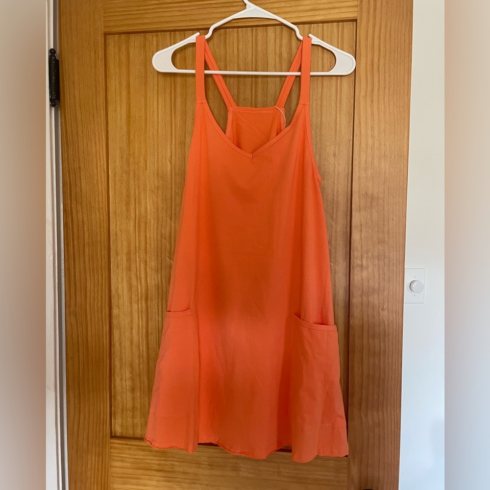 Orange pocket dress with shorts